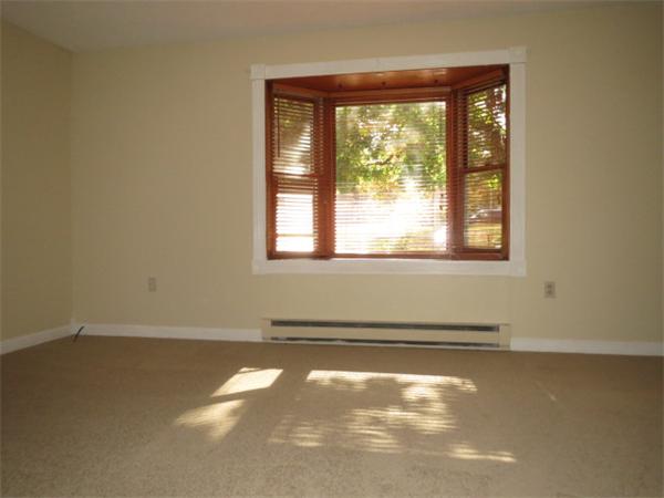 1134 Worcester Street Springfield, MA 01151 - Photo 5 of 14 an empty room with a window