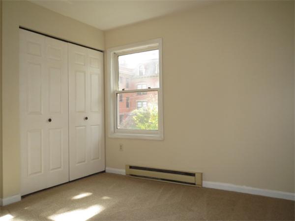 1134 Worcester Street Springfield, MA 01151 - Photo 7 of 14 an empty room with windows