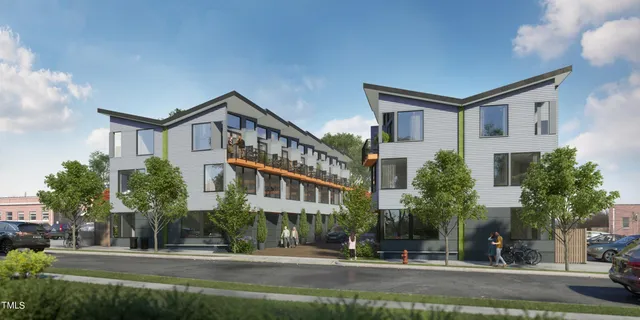 a front view of a building with street view