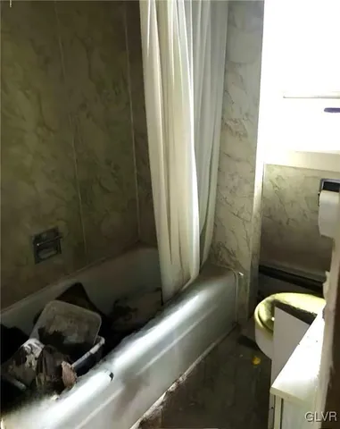 a view of a livingroom with a window