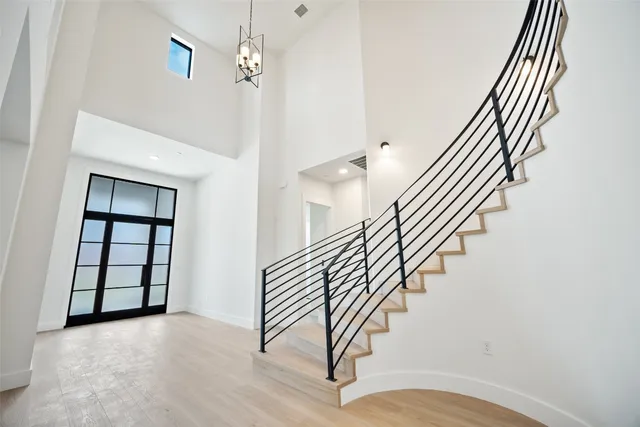 an entryway in a hall with a window