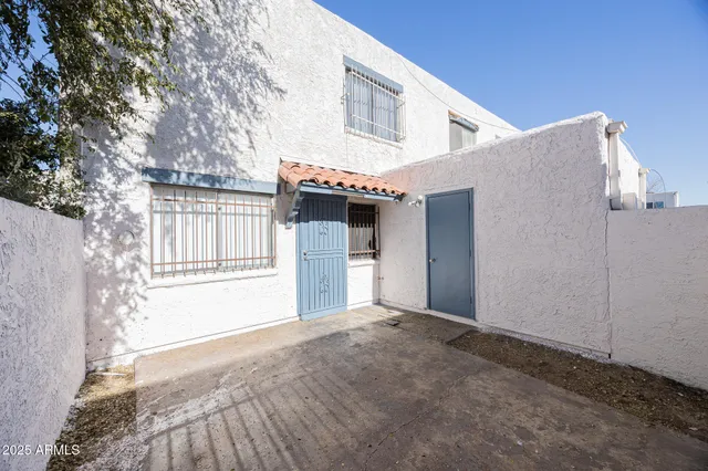 a front view of a house with a garage