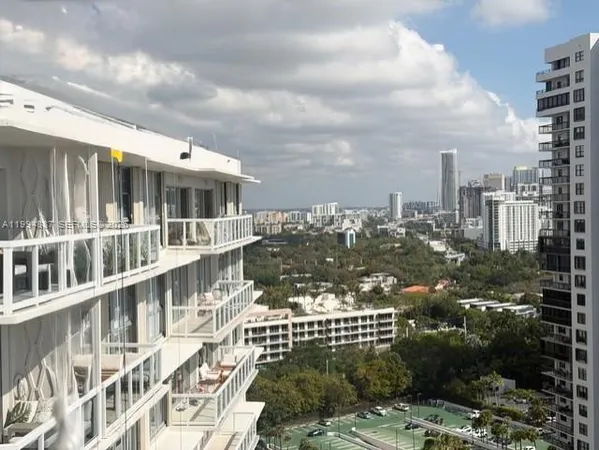 a view of city with tall buildings