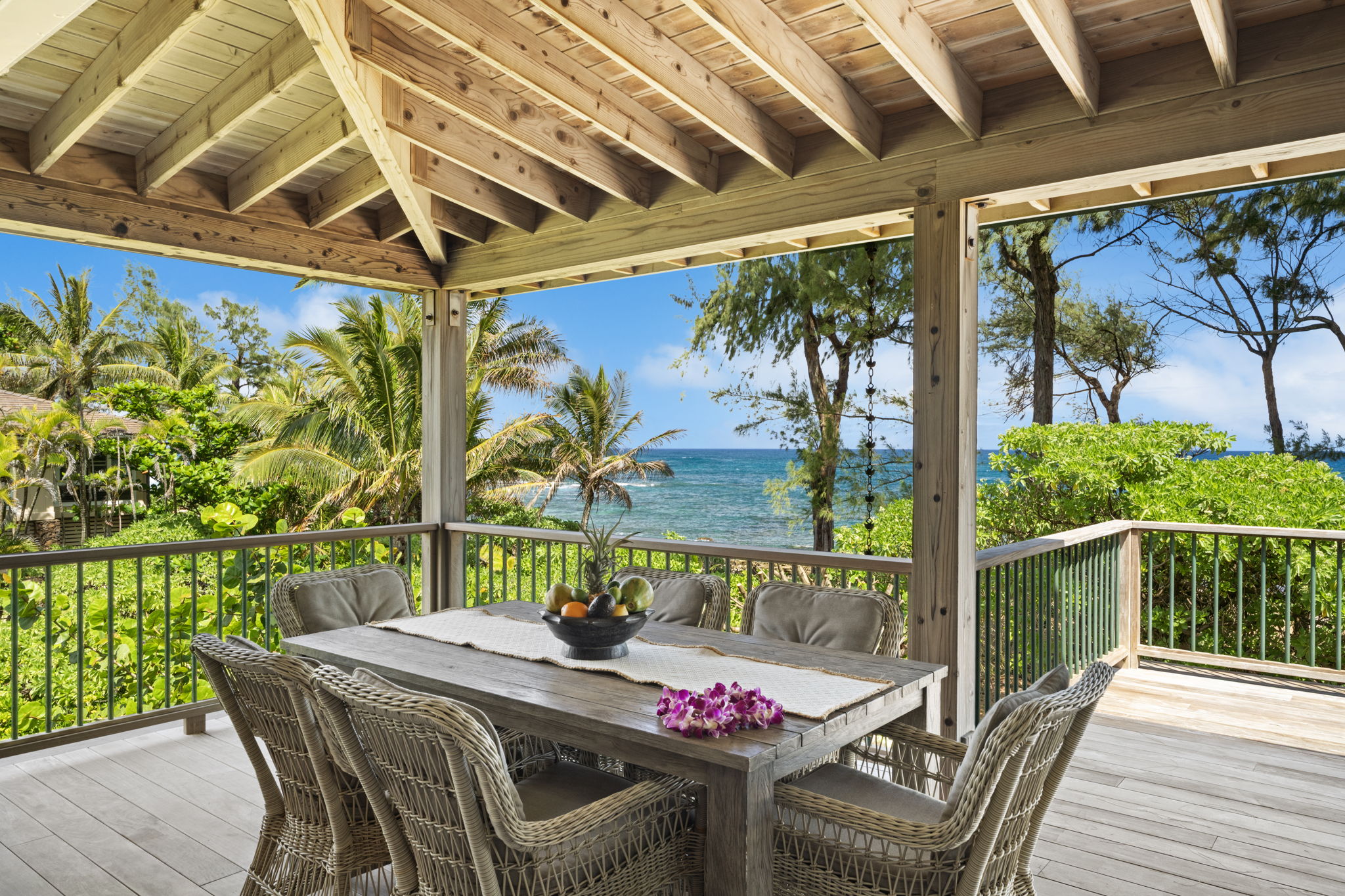 7312 Alealea Road Hanalei, HI 96714 - Photo 2 of 30 a view of a patio with a table chairs and a table