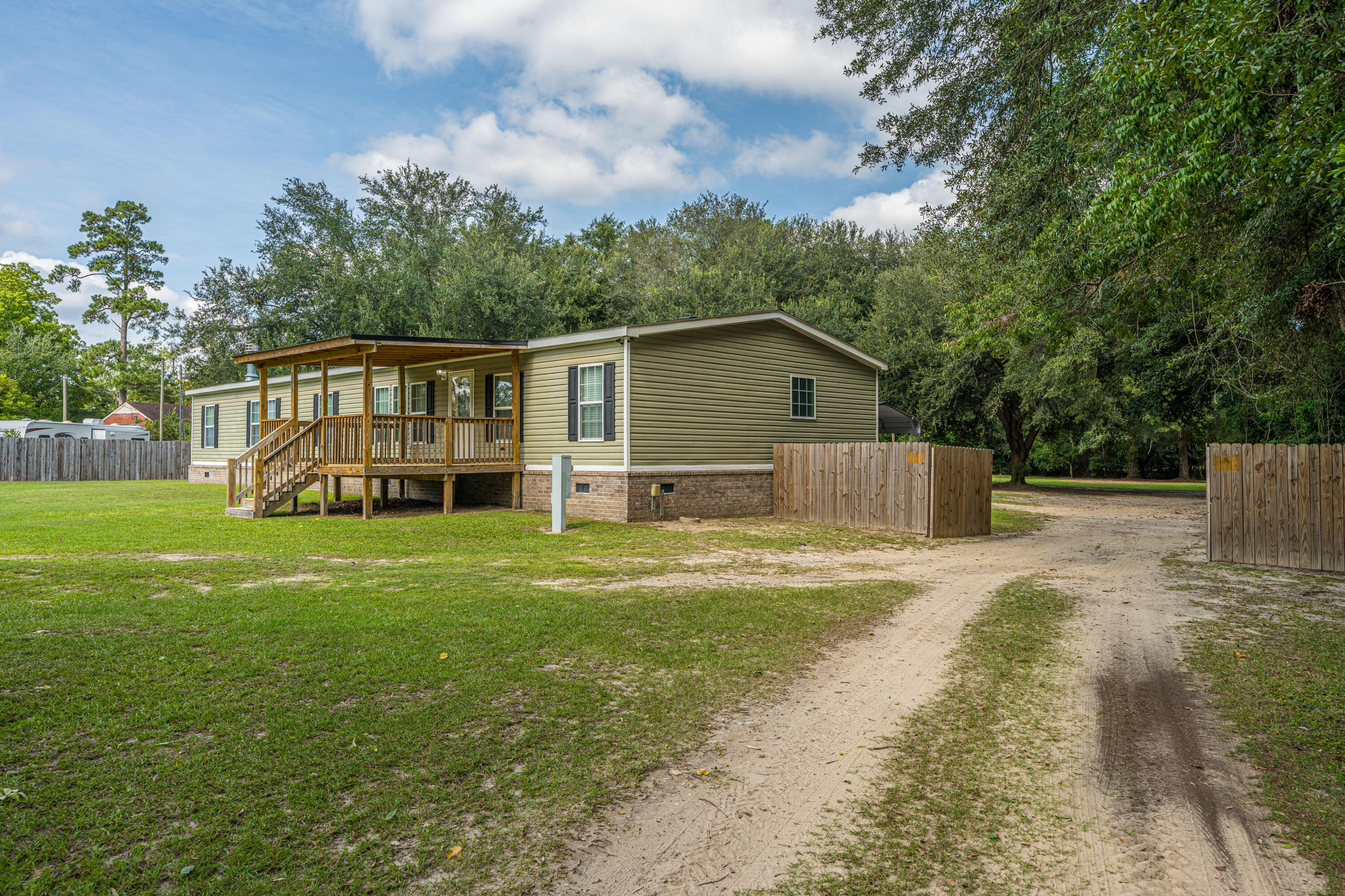 151 Church Road St. Stephen, SC 29479 - Photo 3 of 43 Gated driveway