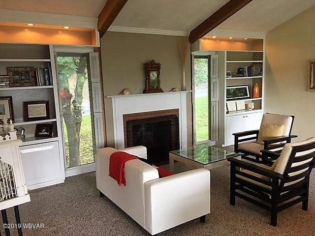 80 Selkirk Road Williamsport, PA 17701 - Photo 9 of 17 Sitting Area with Woodburning Fireplace