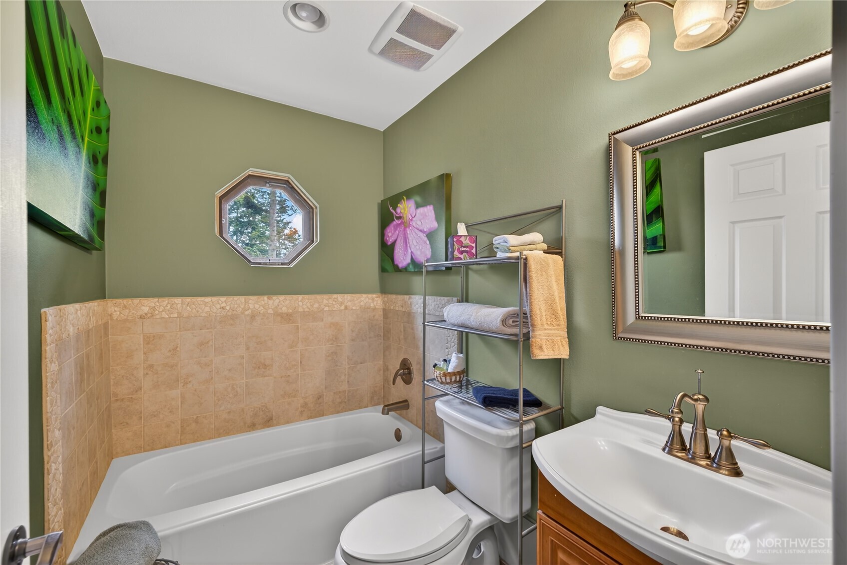 17946 Cobahud Road La Conner, WA 98257 - Photo 32 of 40 a bathroom with a sink mirror vanity and toilet
