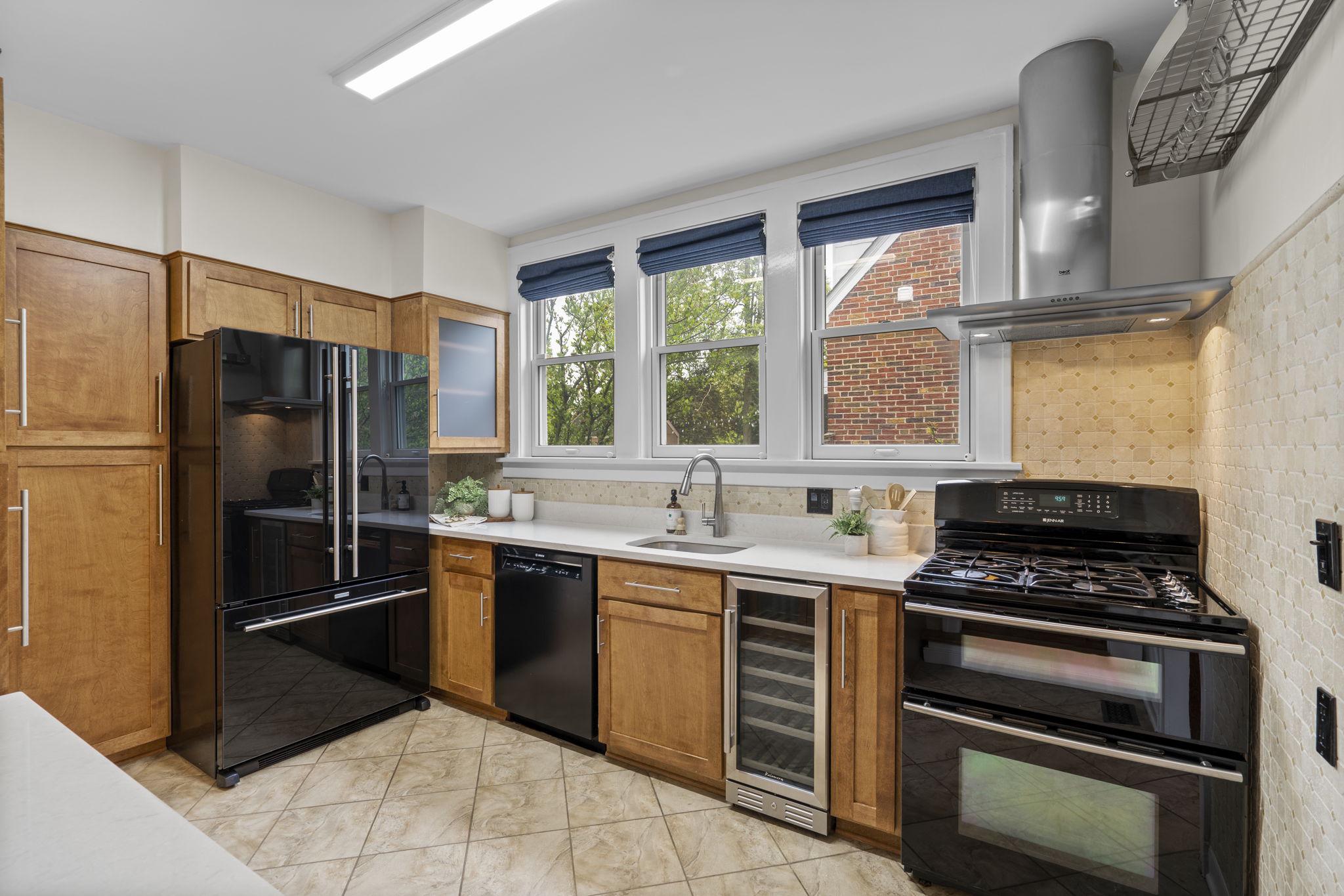 9409 Garwood Street Silver Spring, MD 20901 - Photo 15 of 49 Renovated kitchen with lots of natural light.