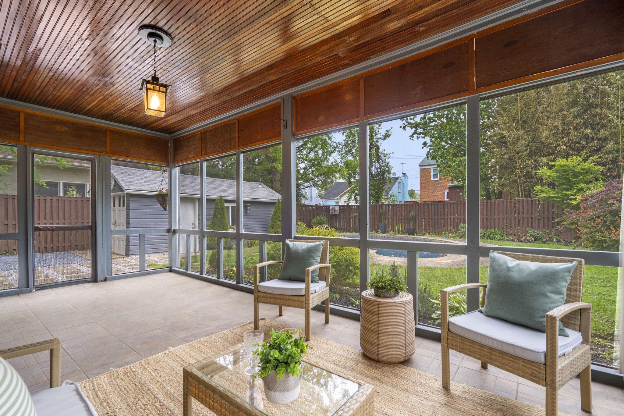 9409 Garwood Street Silver Spring, MD 20901 - Photo 20 of 49 Serene screen porch with garden and pool views.