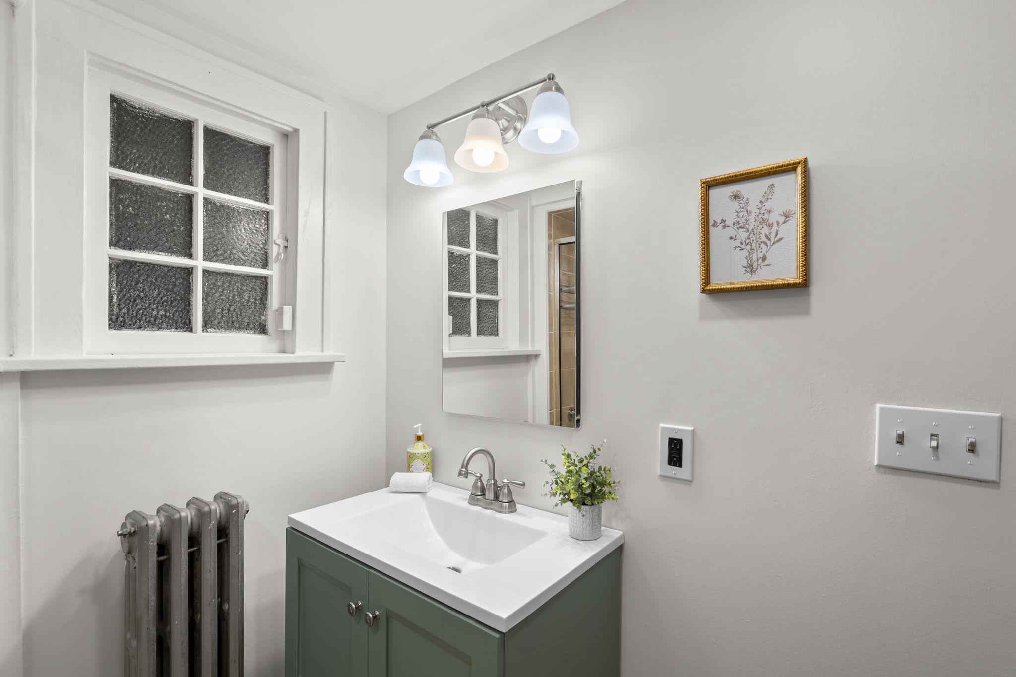 9409 Garwood Street Silver Spring, MD 20901 - Photo 35 of 49 Main Level Full Bath - updates & vintage touches.