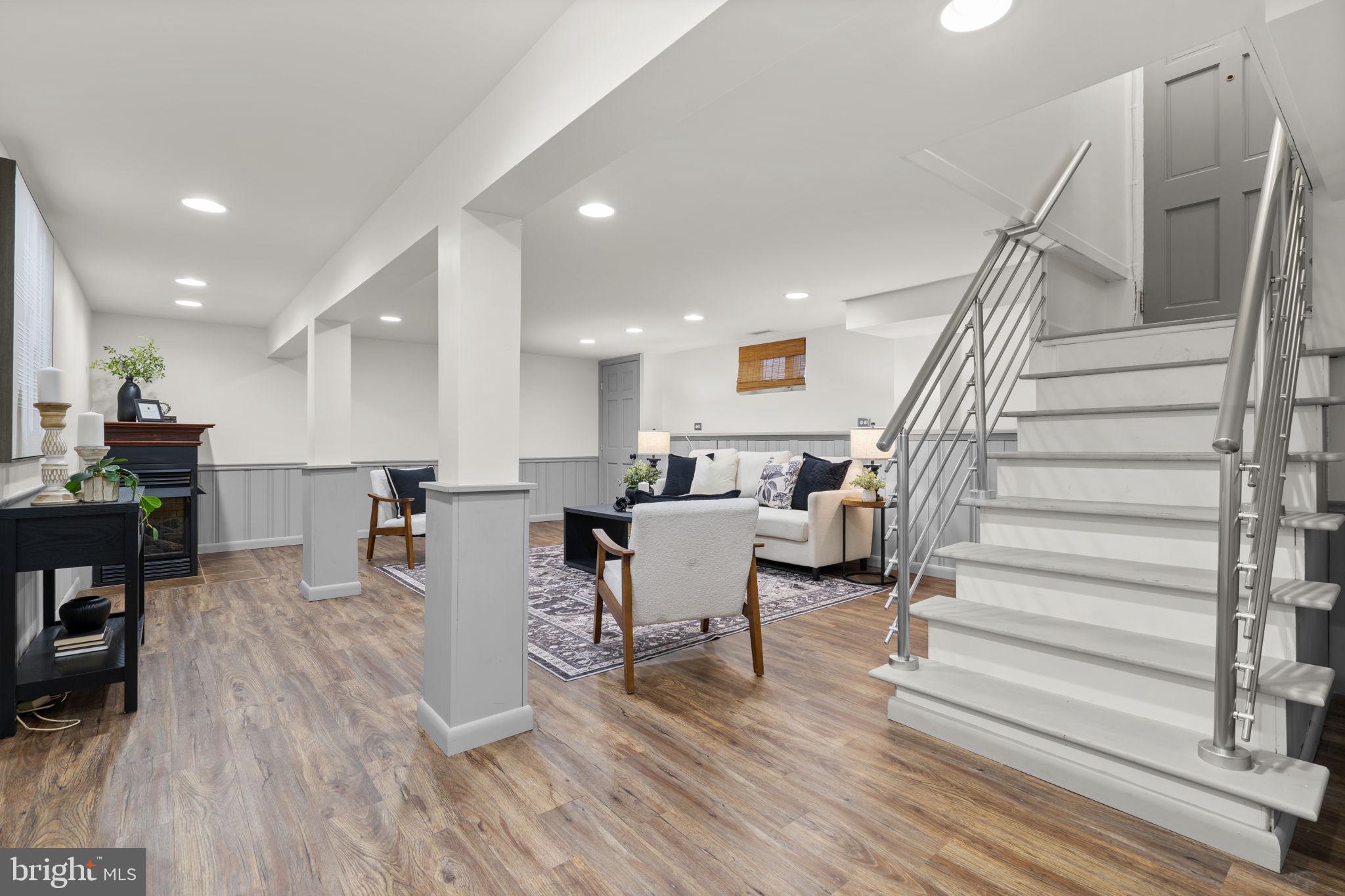 9409 Garwood Street Silver Spring, MD 20901 - Photo 36 of 49 Spacious, modern lower level family room.