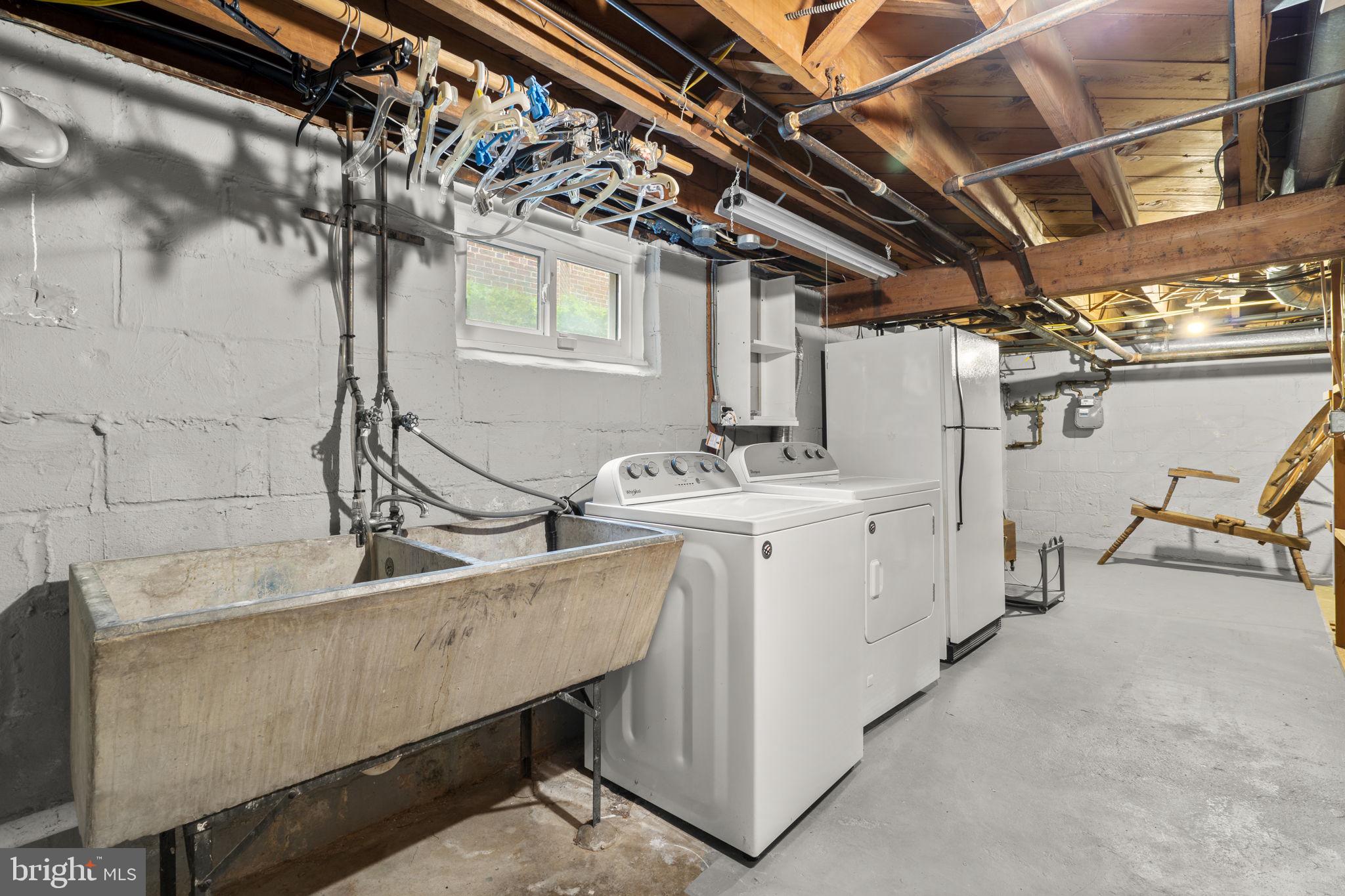 9409 Garwood Street Silver Spring, MD 20901 - Photo 40 of 49 Functional basement laundry area.
