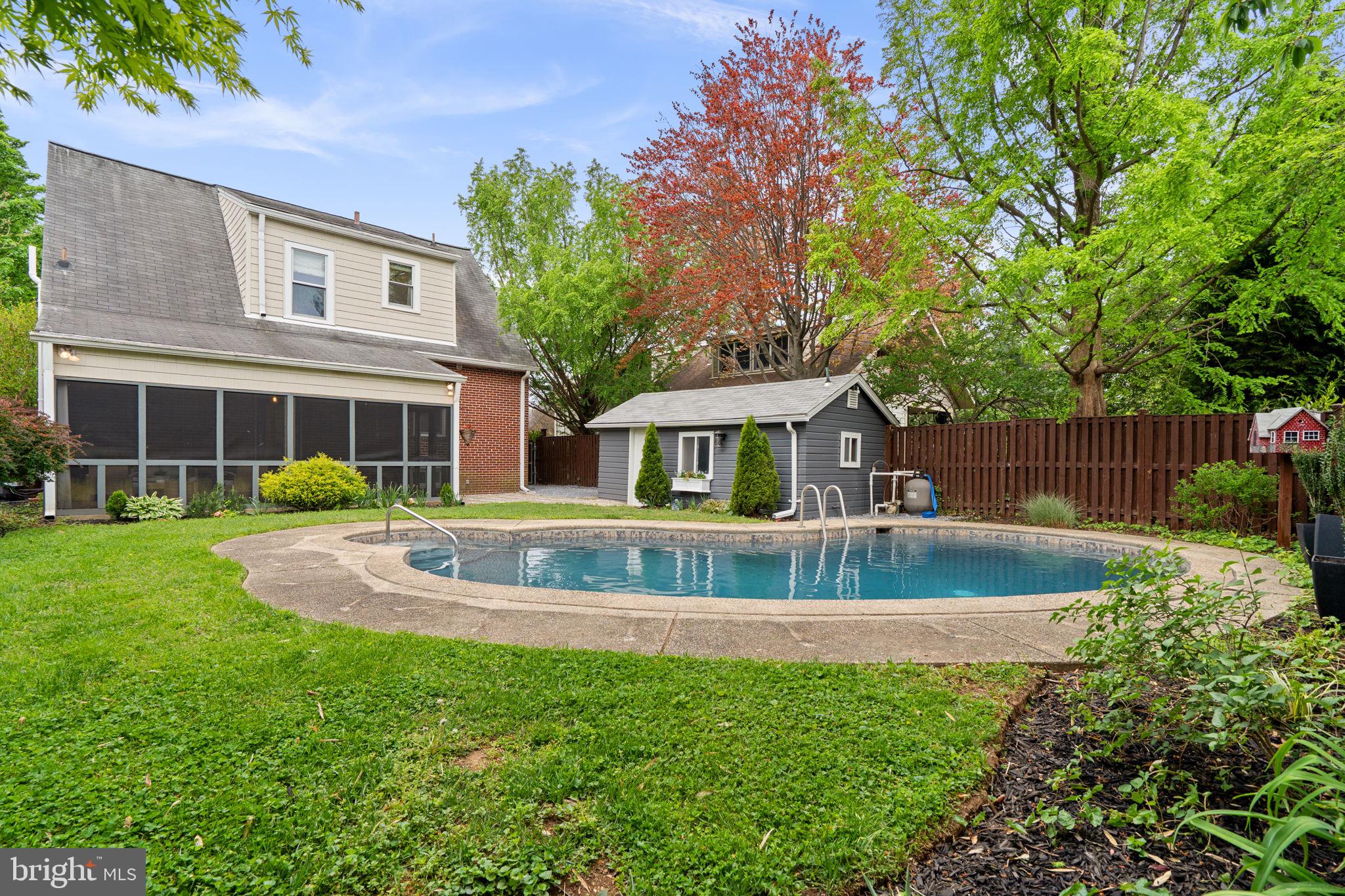 9409 Garwood Street Silver Spring, MD 20901 - Photo 43 of 49 Serene backyard oasis with pool.