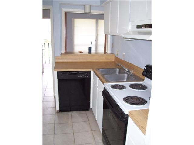 3000 Guadalupe Street, Unit 309 Austin, TX 78705 - Photo 5 of 5 a kitchen with a sink and a stove