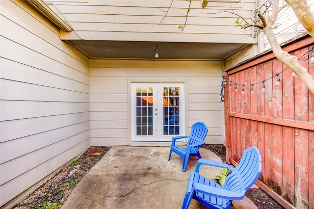 a front view of a house with outdoor seating