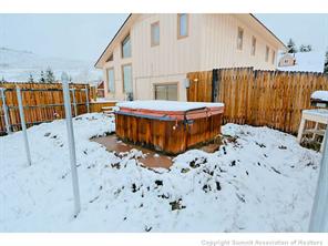 92 Alpine Road Dillon, CO 80435 - Photo 8 of 21 a spacious bedroom with a bed and a walk in closet