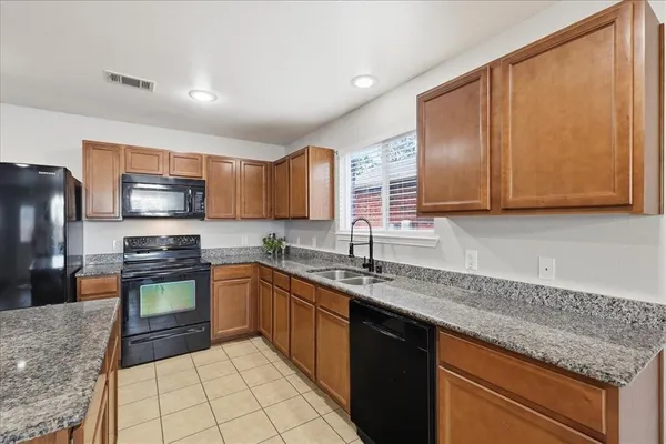 $383,000 | 6908 Derbyshire Drive, Fort Worth, TX 76137