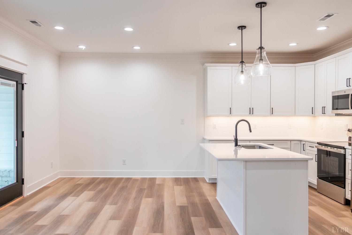 179 Luke Court Rustburg, VA 24588 - Photo 15 of 53 a view of a kitchen with a sink and dishwasher