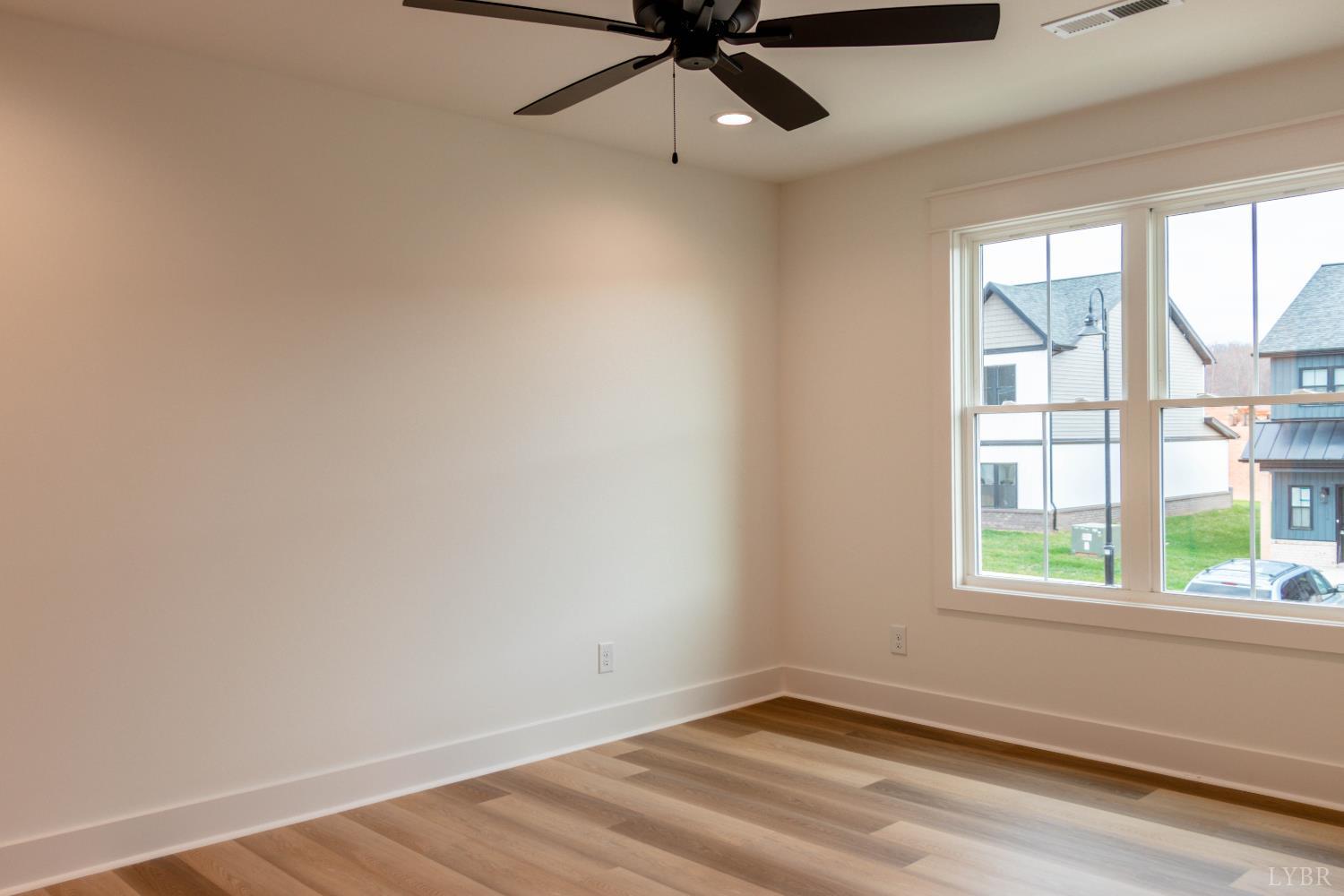 179 Luke Court Rustburg, VA 24588 - Photo 30 of 53 wooden floor in an empty room with a window