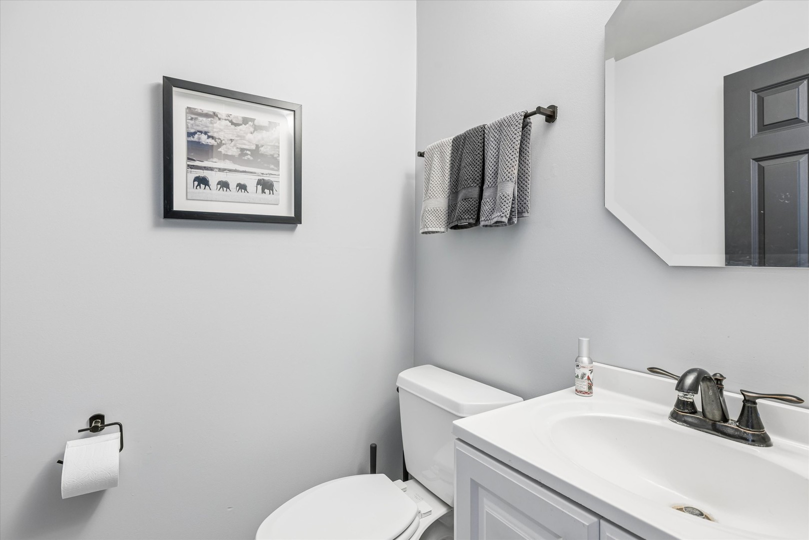 16224 Golf View Drive Lockport, IL 60441 - Photo 11 of 21 a bathroom with a toilet a sink and mirror