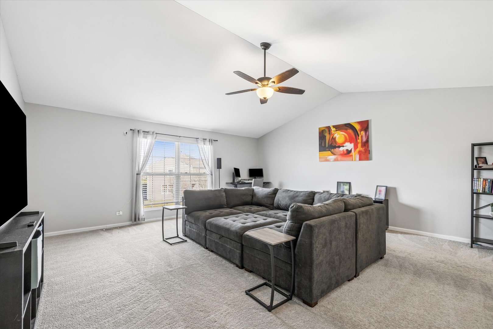 16224 Golf View Drive Lockport, IL 60441 - Photo 13 of 21 a living room with furniture and a flat screen tv