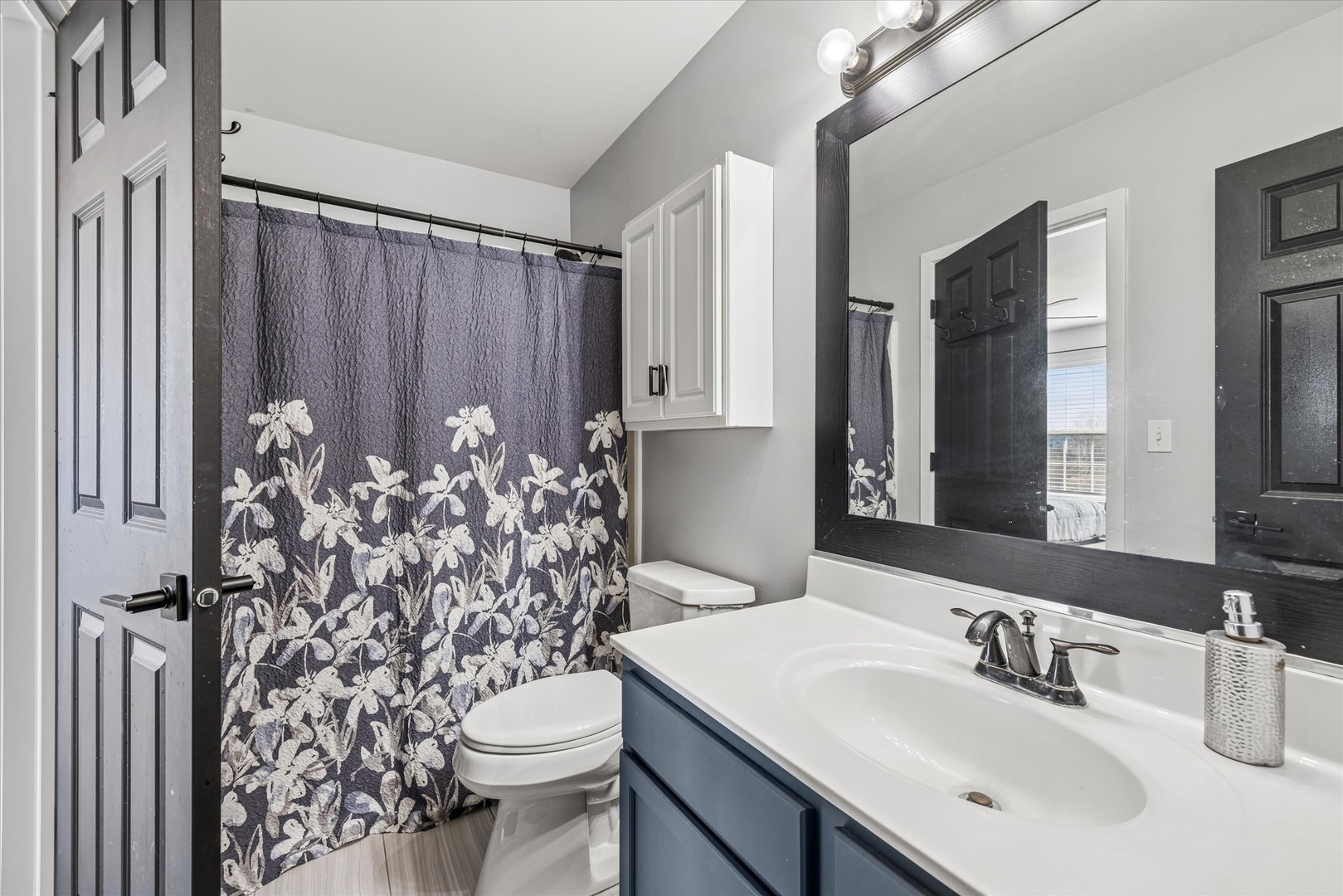 16224 Golf View Drive Lockport, IL 60441 - Photo 16 of 21 a bathroom with a sink toilet and shower