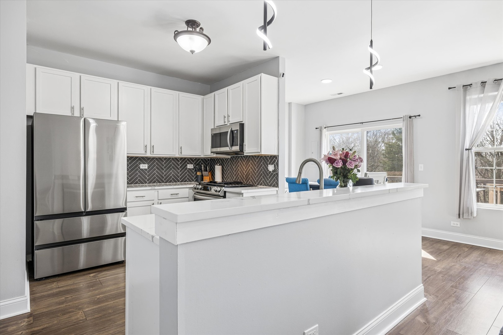 16224 Golf View Drive Lockport, IL 60441 - Photo 7 of 21 a kitchen with kitchen island a sink stainless steel appliances and cabinets