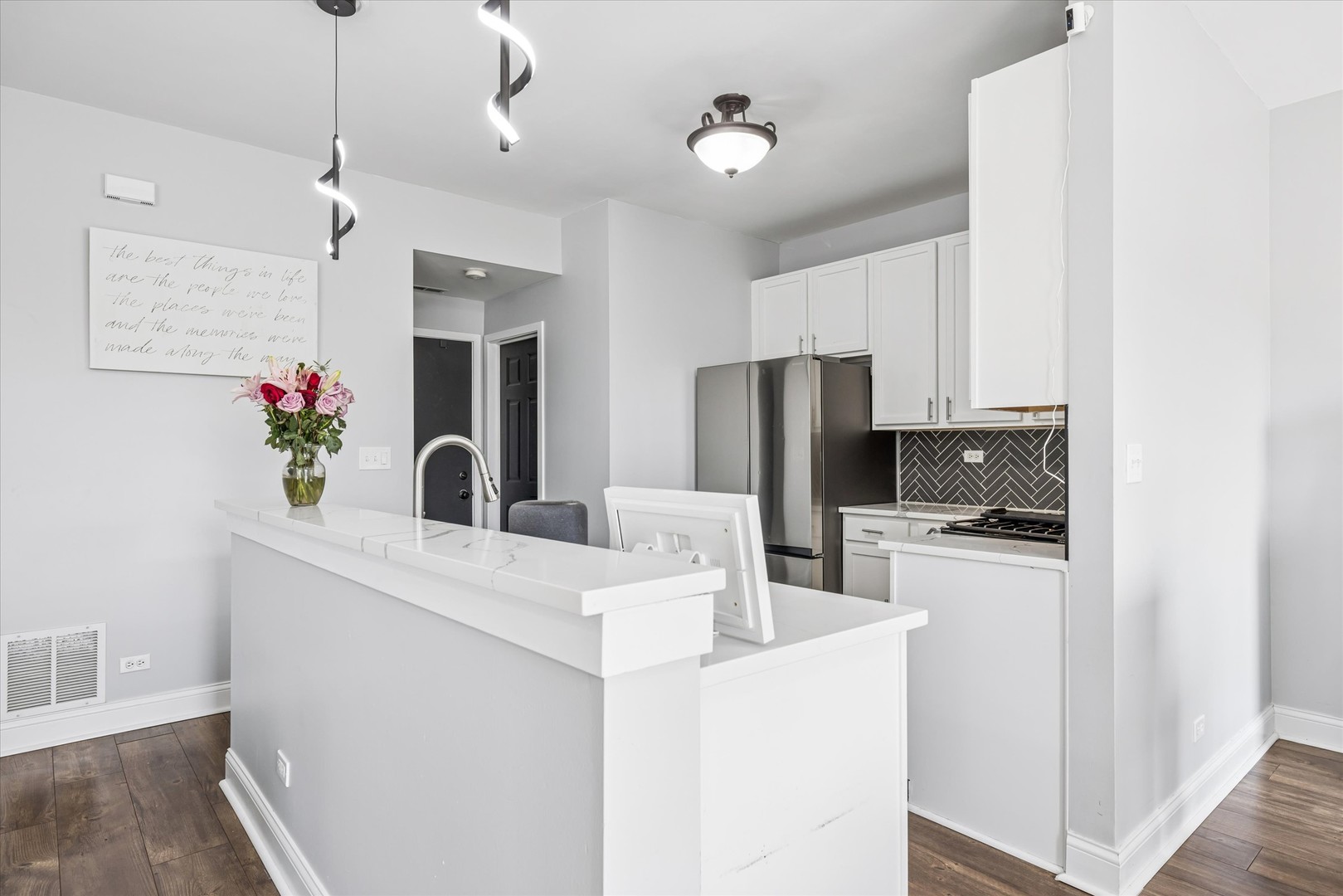 16224 Golf View Drive Lockport, IL 60441 - Photo 8 of 21 a kitchen with kitchen island a refrigerator stove and sink