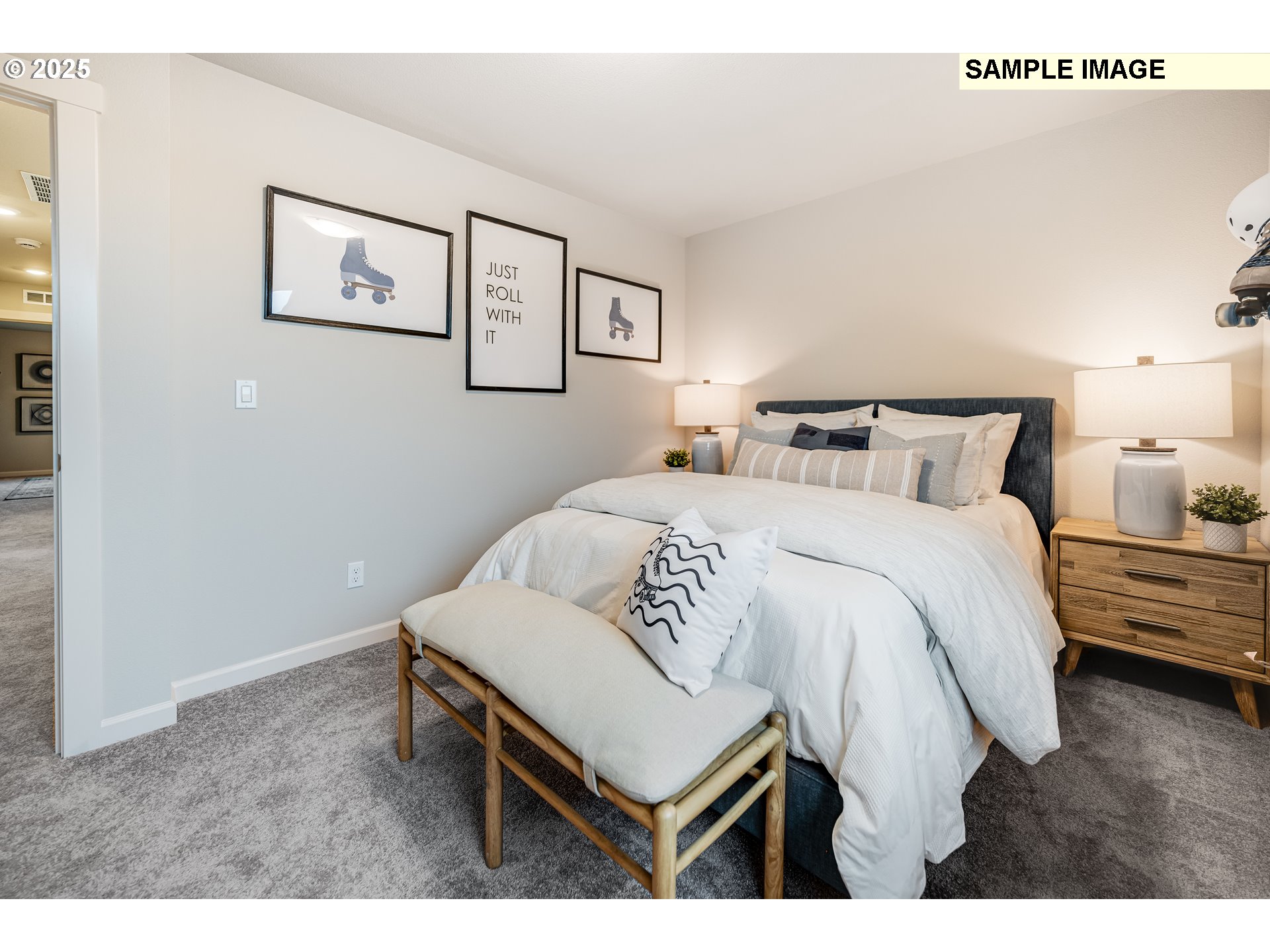 8921 Southwest Choke Cherry Tualatin, OR 97062 - Photo 19 of 28 a bedroom with a bed and a table
