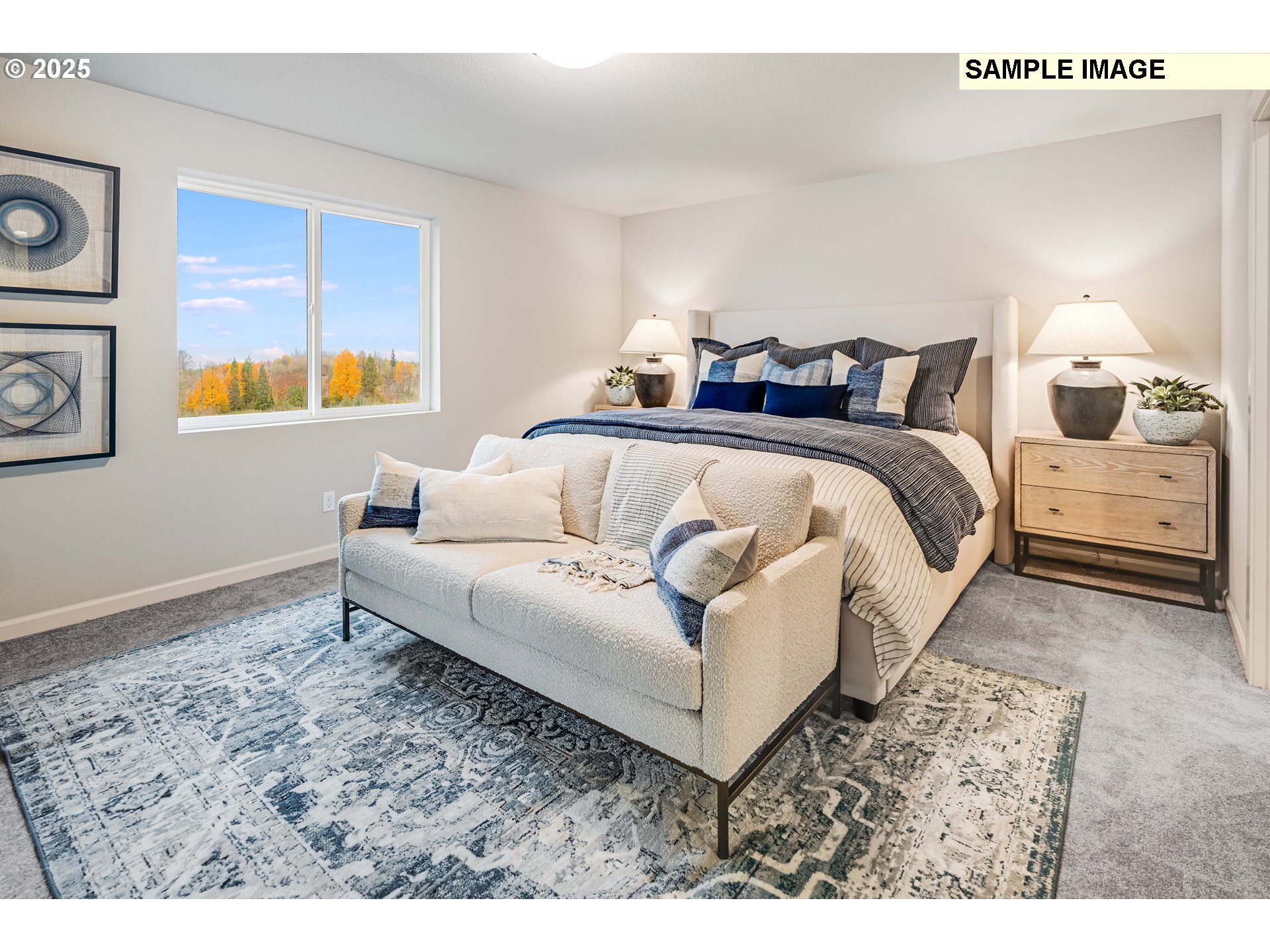 8921 Southwest Choke Cherry Tualatin, OR 97062 - Photo 21 of 28 a spacious bedroom with a bed and wooden floor
