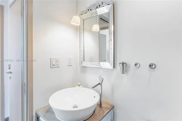 a view of a living room and dining room