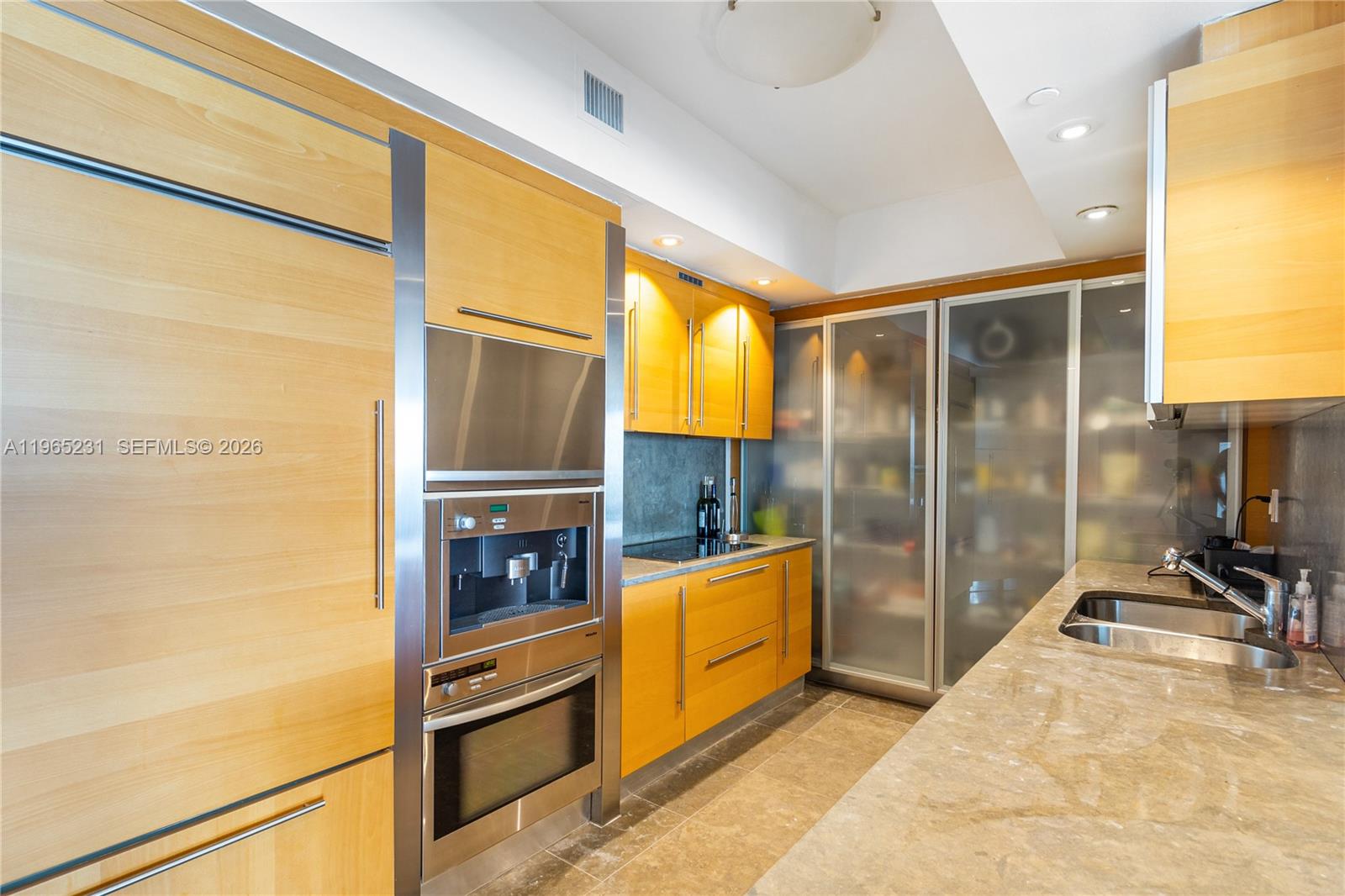 450 Alton Road, Unit 3703 Miami Beach, FL 33139 - Photo 8 of 27 a spacious bathroom with a tub and a shower