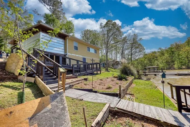 a view of swimming pool with furniture in it