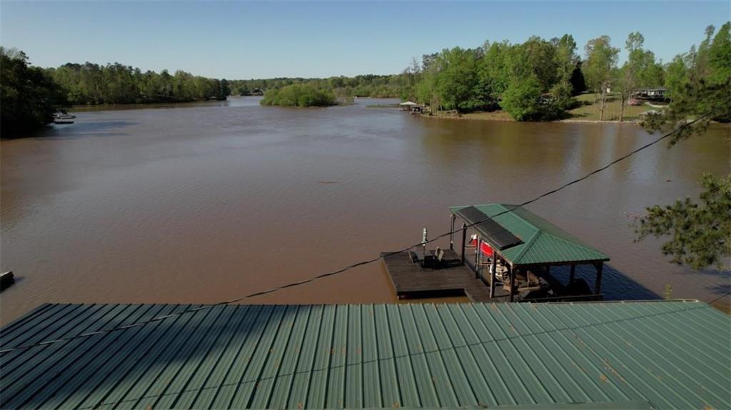 480 Friar Tuck Circle Covington, GA 30014 - Photo 50 of 56 an aerial view of a house with a lake view