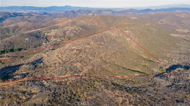 a view of a mountain from a yard