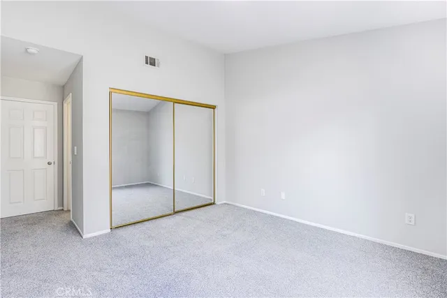 an empty room with sliding door