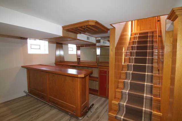 a view of deck with wooden floor and fence