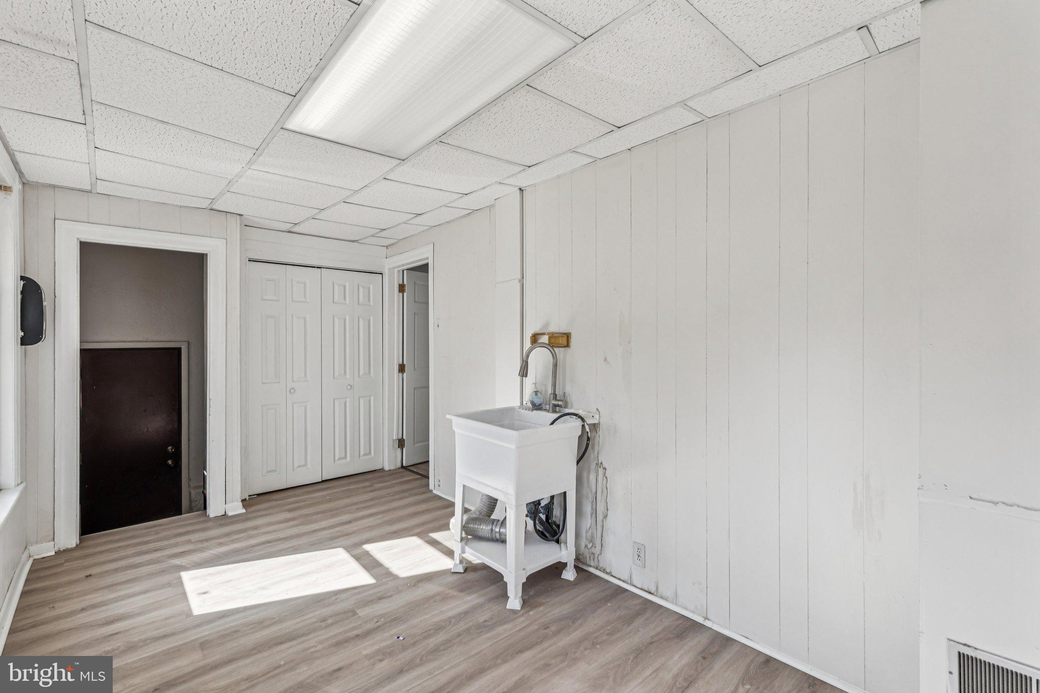3408 Marshall Road Drexel Hill, PA 19026 - Photo 17 of 28 a view of a room with wooden floor and white walls