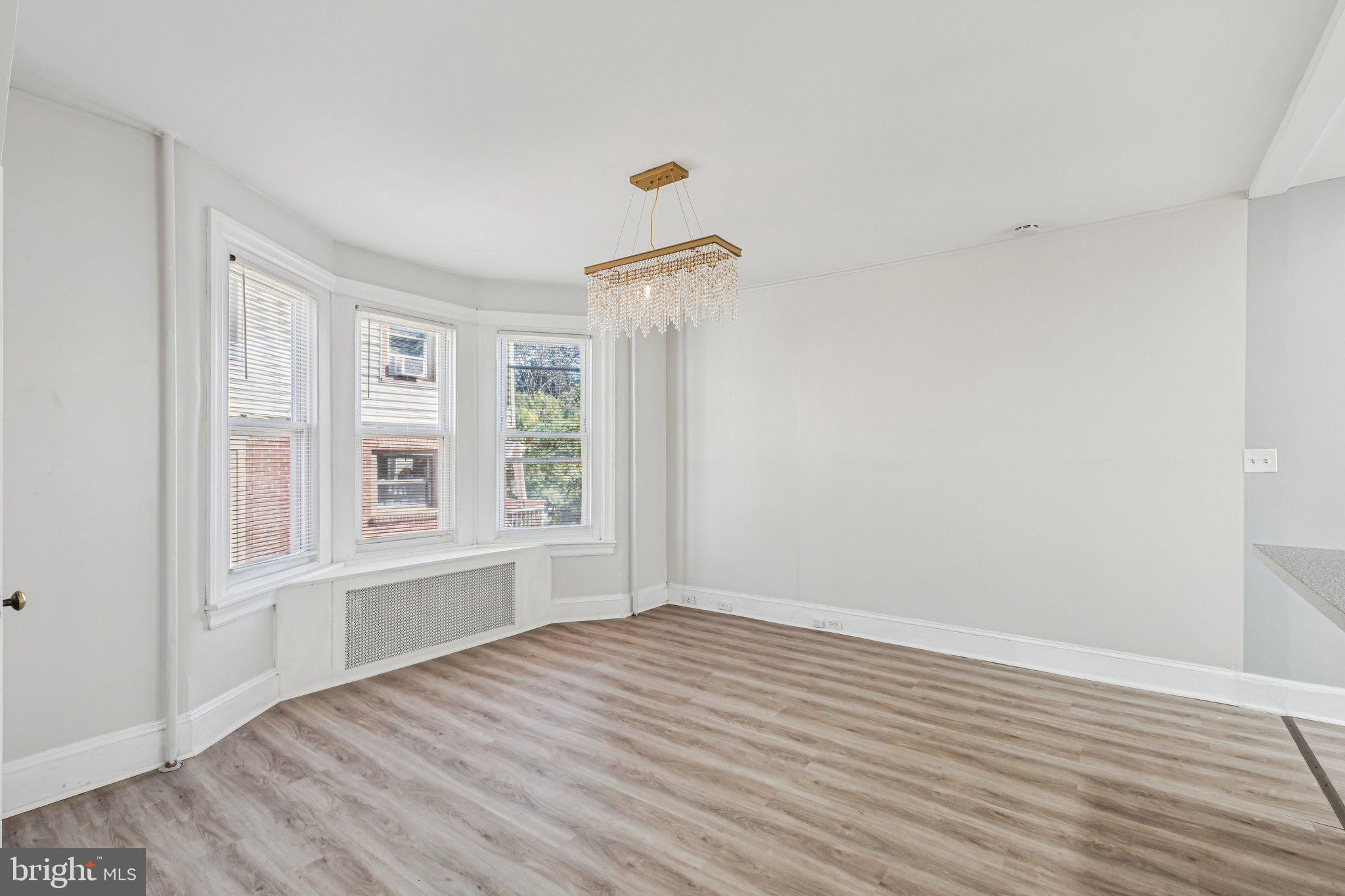 3408 Marshall Road Drexel Hill, PA 19026 - Photo 25 of 28 wooden floor in an empty room with a window