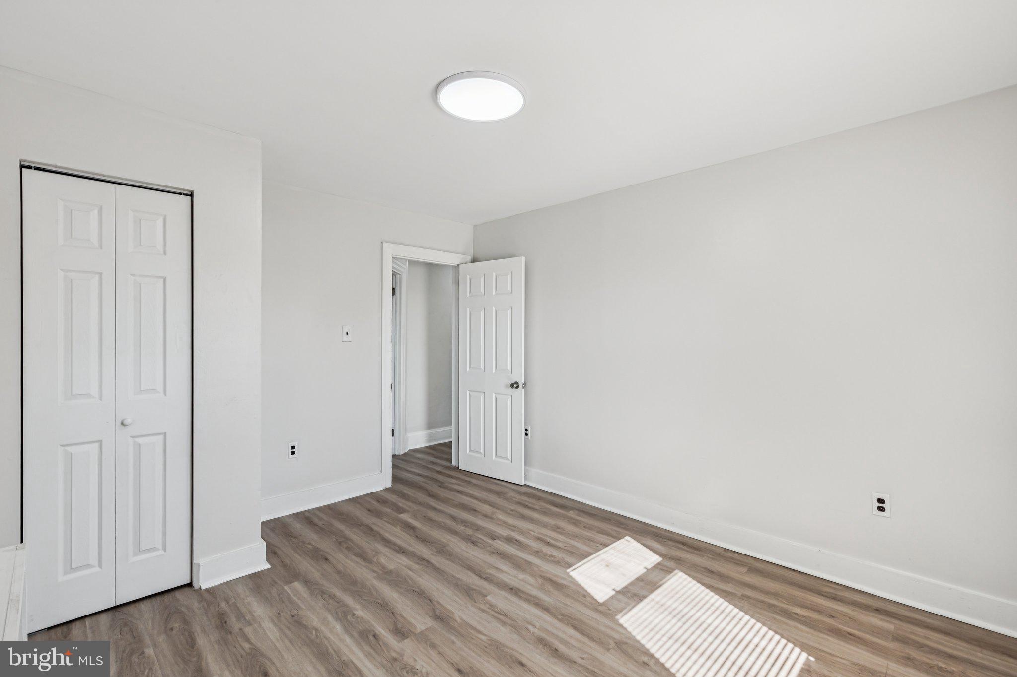 3408 Marshall Road Drexel Hill, PA 19026 - Photo 9 of 28 a view of a room with wooden floor and closet