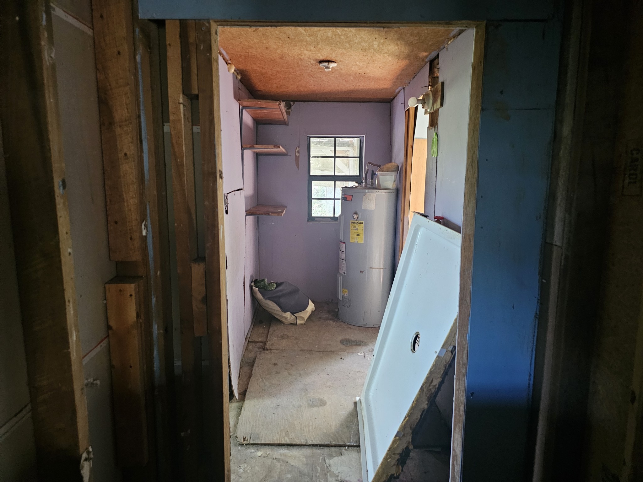 677 Howell Hill Road Flintville, TN 37335 - Photo 15 of 16 a view of a hallway with wooden floor and staircase