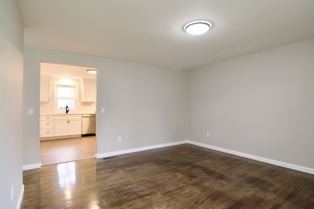68 Sunrise Terrace Springfield, MA 01119 - Photo 12 of 42 a view of a room with wooden floor and a sink