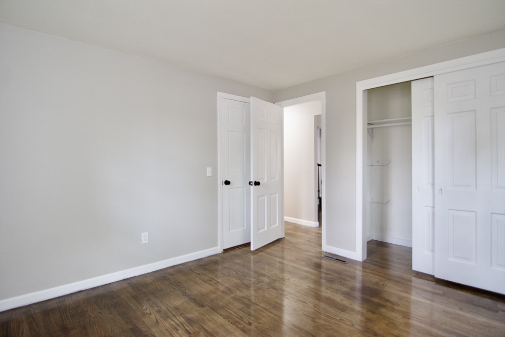68 Sunrise Terrace Springfield, MA 01119 - Photo 24 of 42 a view of an empty room with wooden floor
