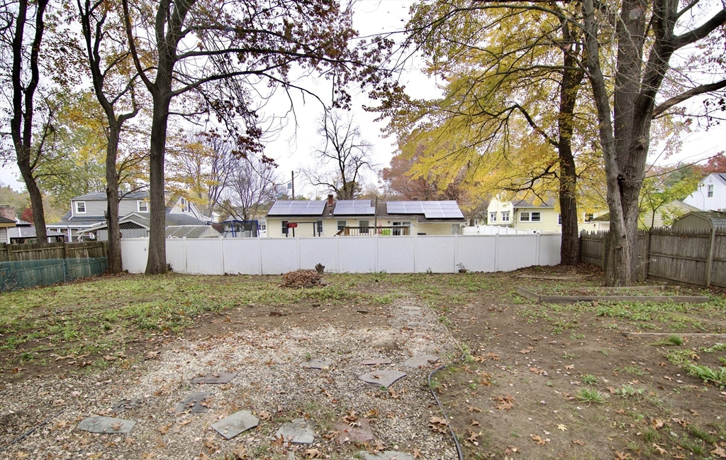 68 Sunrise Terrace Springfield, MA 01119 - Photo 4 of 42 a view of a yard with trees