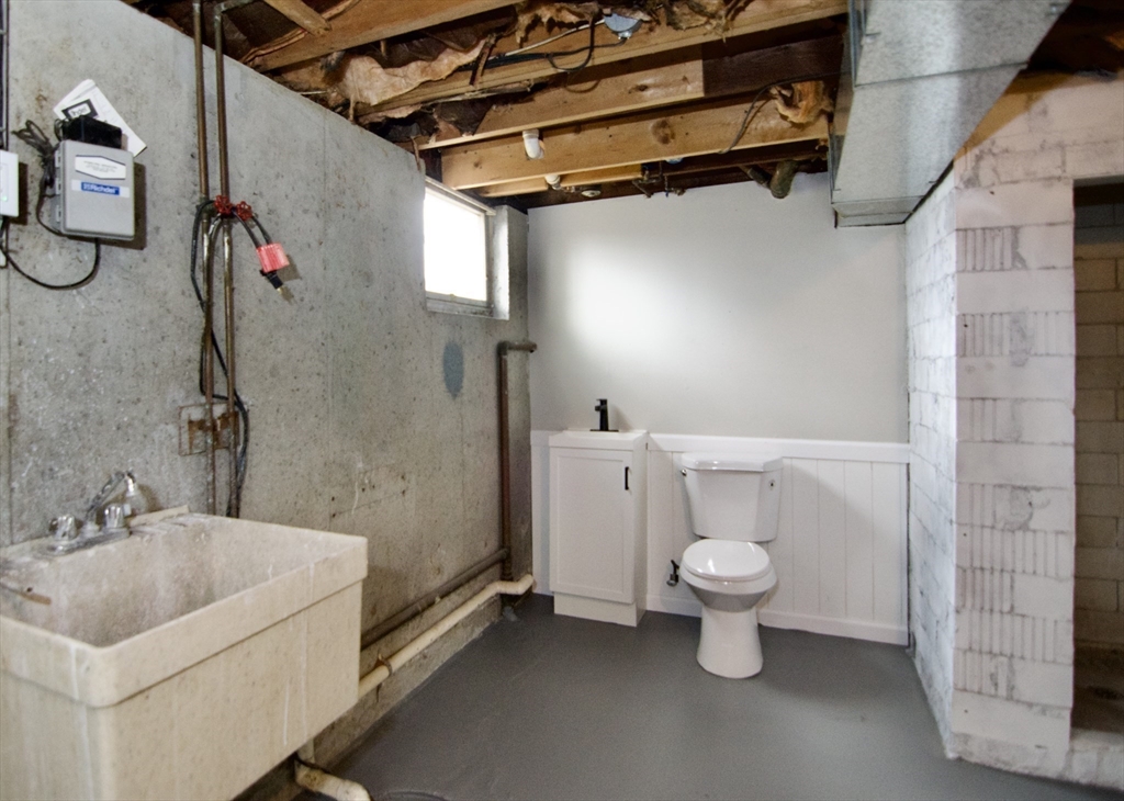 68 Sunrise Terrace Springfield, MA 01119 - Photo 42 of 42 a bathroom with a sink a toilet and shower