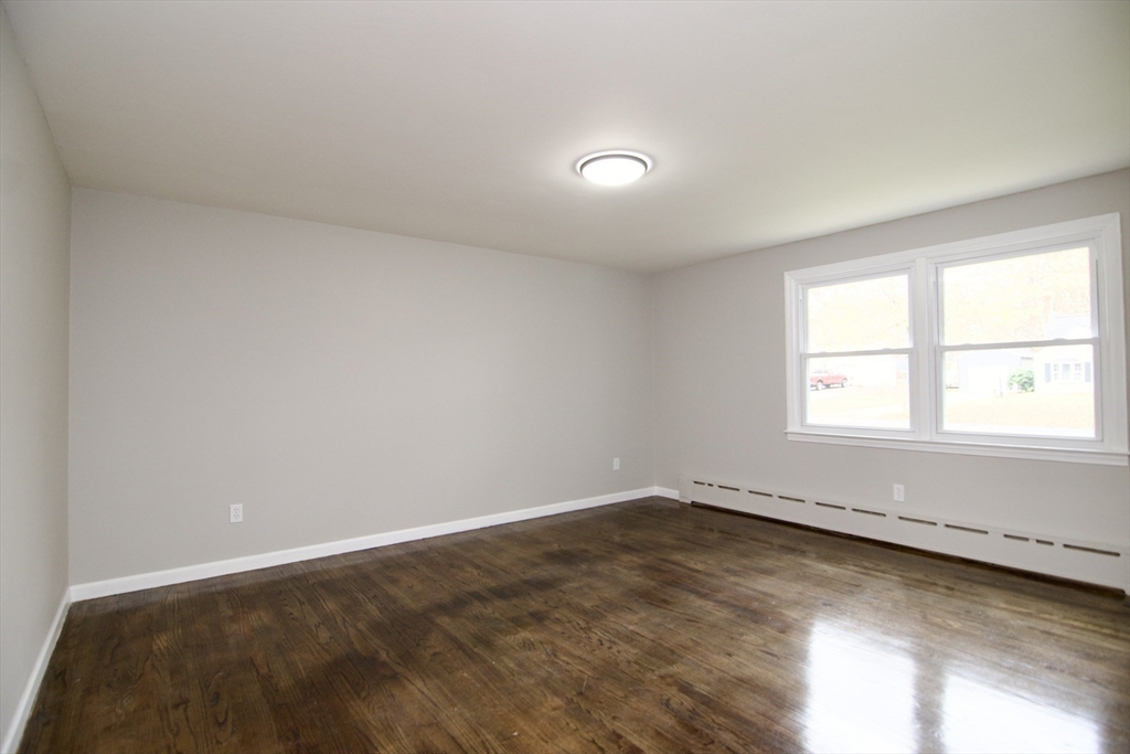 68 Sunrise Terrace Springfield, MA 01119 - Photo 10 of 42 an empty room with a window