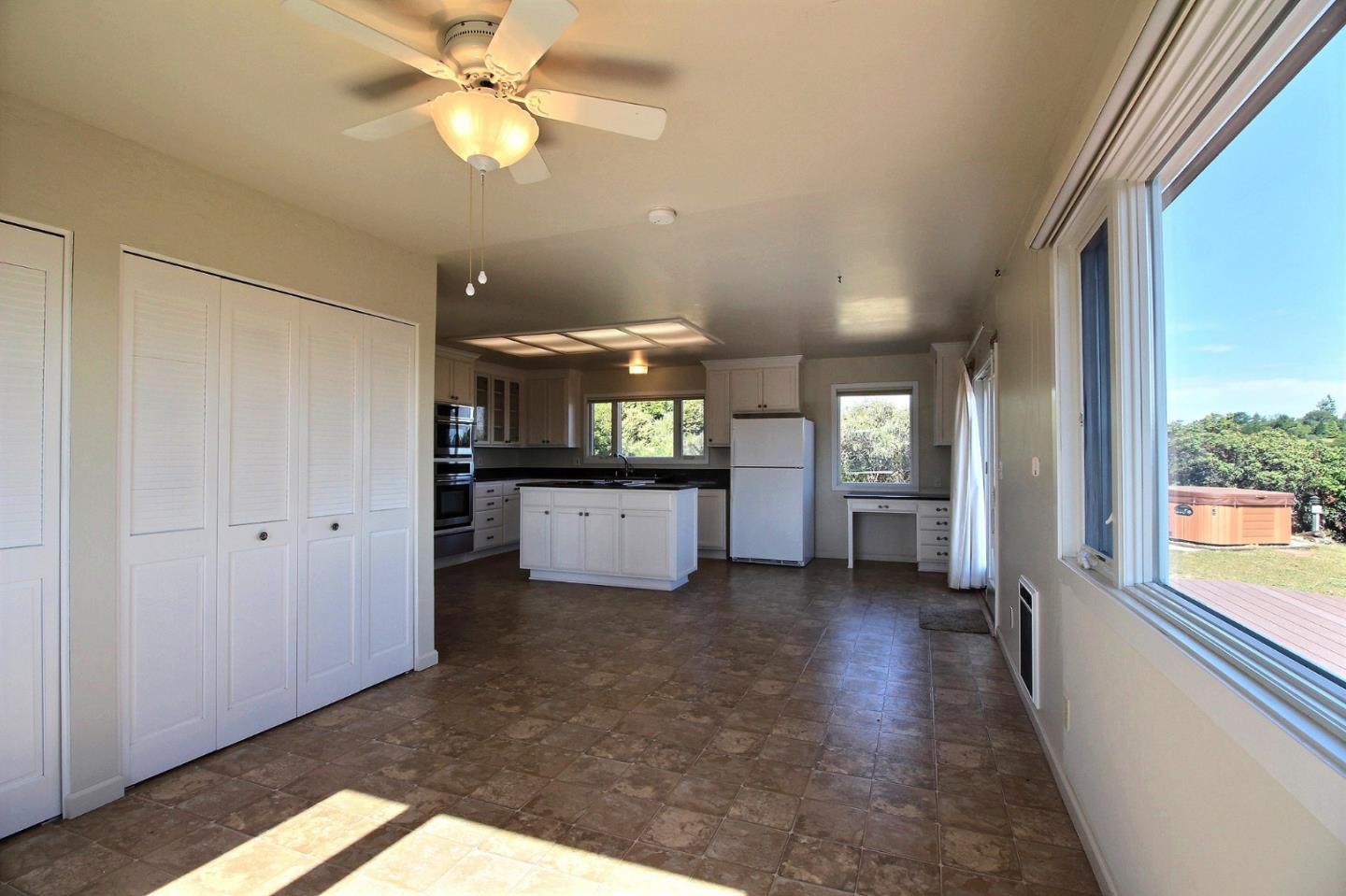 16999 McGill Road Saratoga, CA 95070 - Photo 15 of 41 a view of a kitchen with a sink and a window
