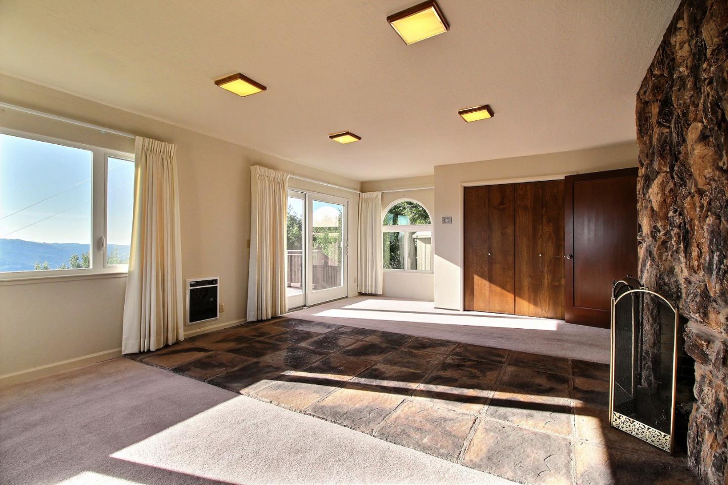 16999 McGill Road Saratoga, CA 95070 - Photo 27 of 41 a view of a electric room with a chandeliers