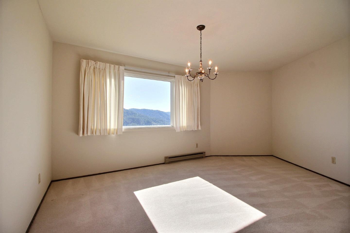 16999 McGill Road Saratoga, CA 95070 - Photo 29 of 41 an empty room with a window