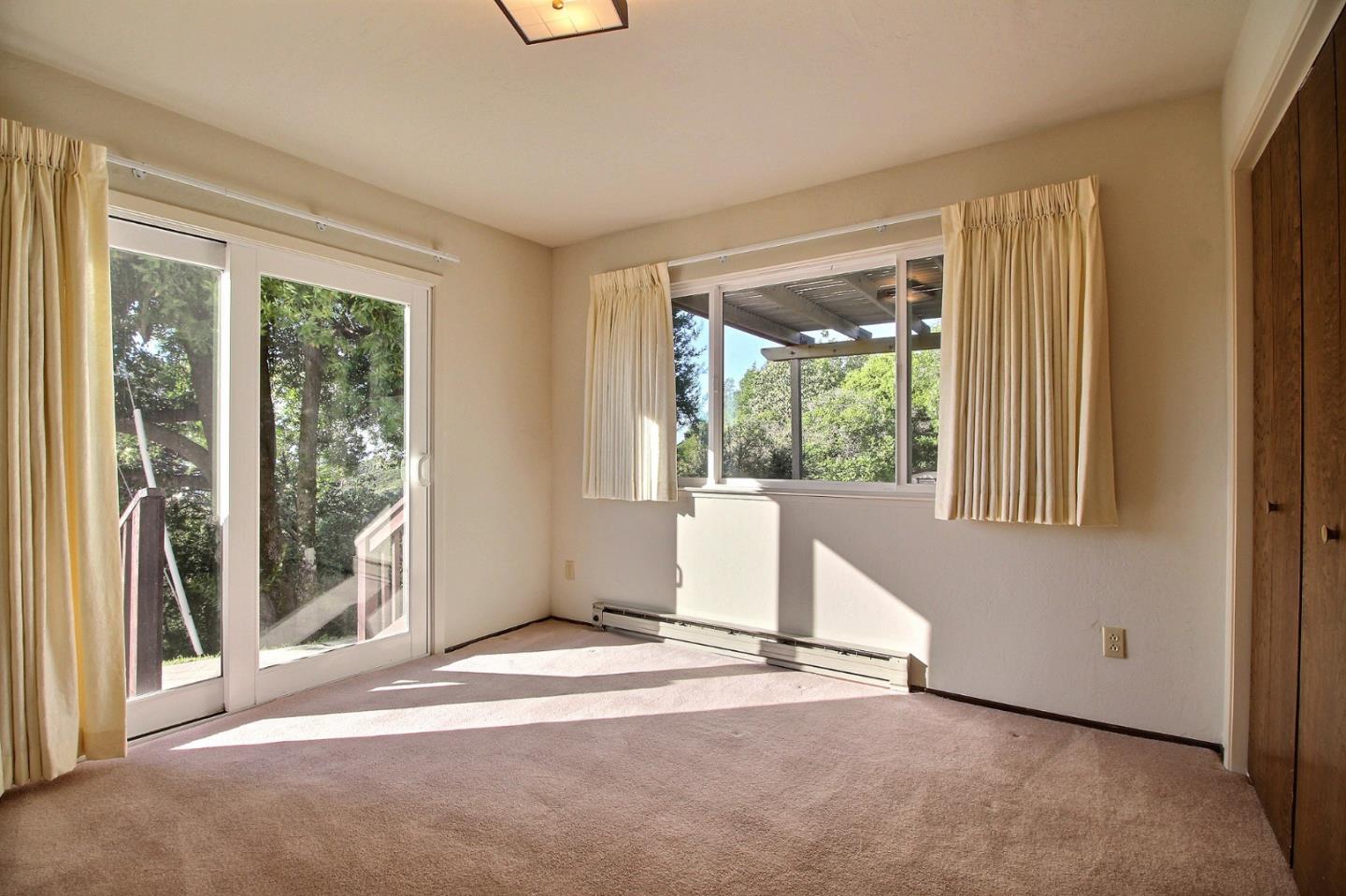 16999 McGill Road Saratoga, CA 95070 - Photo 30 of 41 a view of a room with a large window